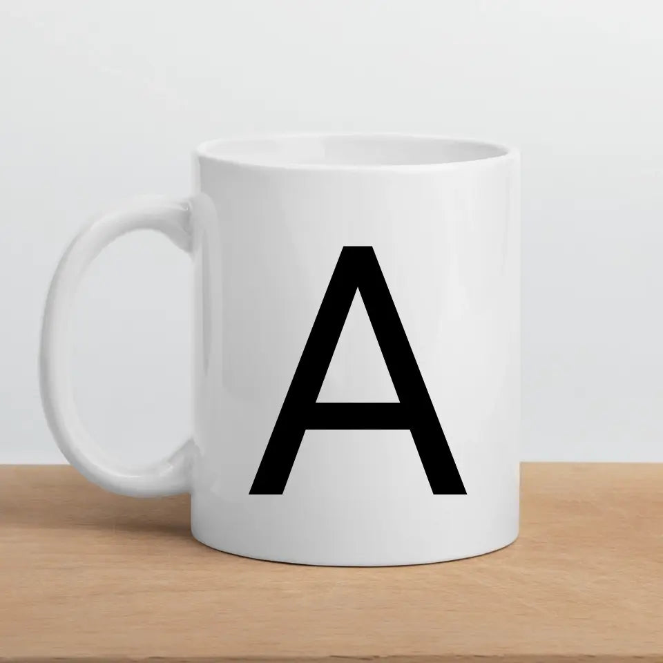Minimalistische Buchstabentasse