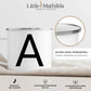 Minimalistische Buchstabentasse