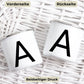 Minimalistische Buchstabentasse