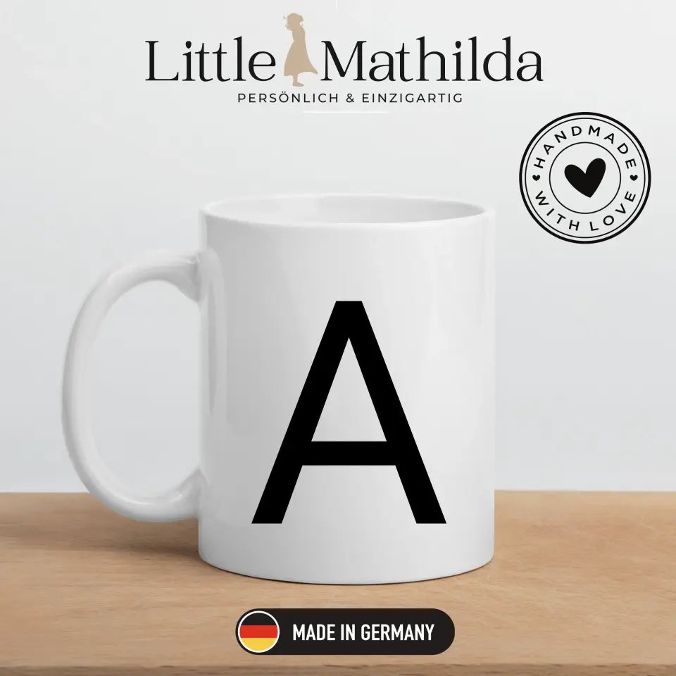 Minimalistische Buchstabentasse